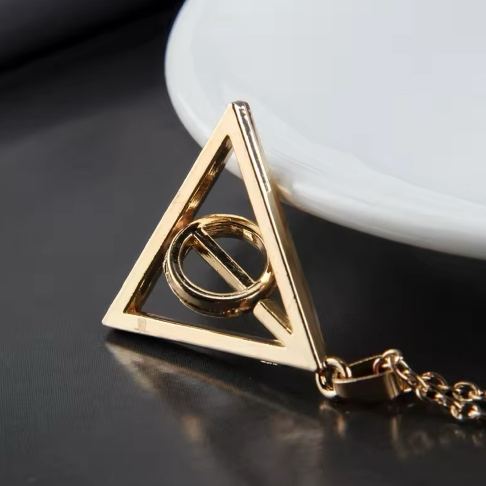 Gold Tone Harry Potterter Deathly Hallows Symbol With Spinning Center Circle - Picture 2 of 8